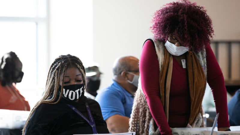 Ruby Freeman and Shaye Moss conducting election administration.